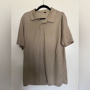 Khaki golf polo. Size large. Regular fit. 100% polyester.